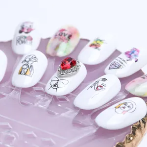 Artistic nail stickers with minimalist line art and a luxury red heart gemstone accent