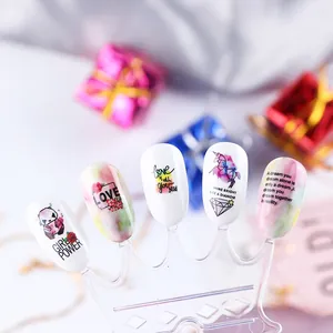 Artistic nail stickers with panda, unicorn and floral patterns on crown display stand
