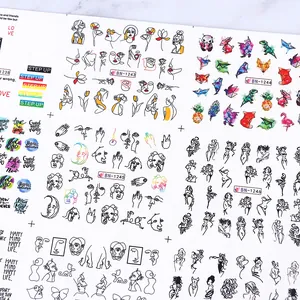 Detailed view of nail art stickers featuring minimalist line art and geometric animals