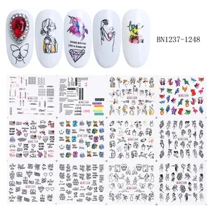 Black and white line art nail stickers with abstract faces and animal designs
