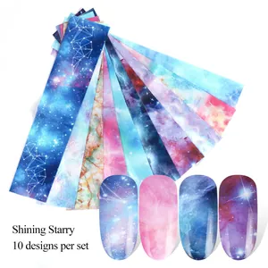 Set de 10 feuilles de transfert nail art ciel étoilé aux motifs galaxie et cosmique