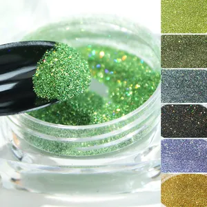 Macro shot of fine emerald green nail glitter powder with multi-color laser holographic effect