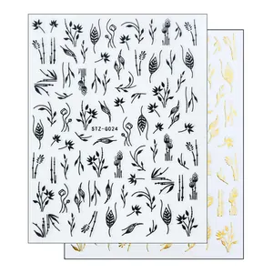 Detail of 3D nail art stickers STZ-G024 with black and gold leaf foliage patterns