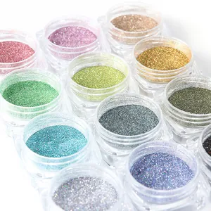 Macro shot of 12 jars of holographic chameleon nail glitter powder for manicure art