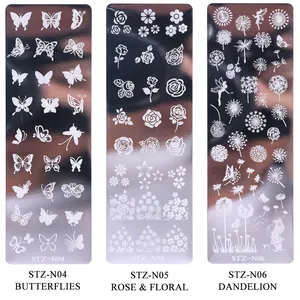 Vista dettagliata delle piastre per nail art in acciaio con motivi floreali incisi