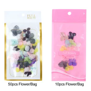Detail view of dried nail art flower sets in 10pcs and 50pcs packaging options