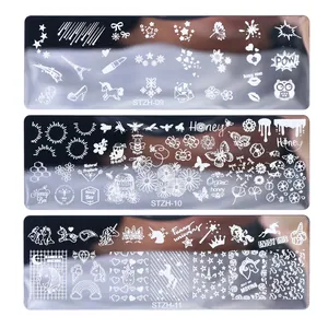 Detailed laser-etched nail stamping plates featuring bee and floral patterns