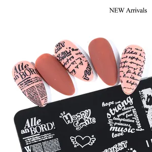 Metal nail stamping plate with inspirational words and vintage text stiletto nails