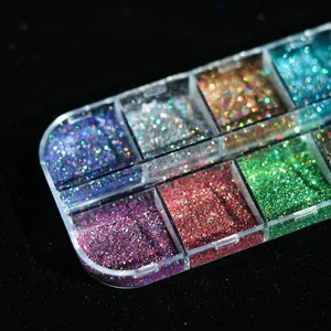 Macro shot of holographic nail glitter powders in a multi-grid storage container