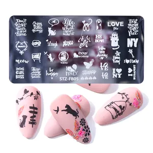 Macro view of nail art stamping plate STZ-FB05 with text designs and pink sample nails