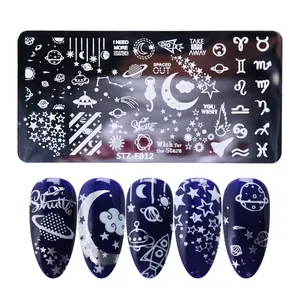 Close-up of STZ-FB12 space-themed nail plate with moon, stars, and UFO patterns
