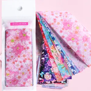 Adesivi per nail art rosa con motivi floreali e rose nella confezione originale