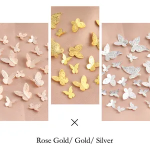 Adornos de mariposa de metal para uñas en acabados mate oro rosa, dorado y plateado