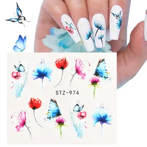 Water transfer nail art stickers featuring blue butterflies and watercolor floral patterns