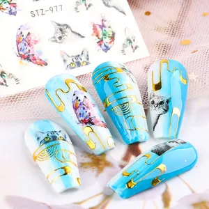 Artistic nail stickers featuring watercolor butterflies, gray cats, and gold foil lines