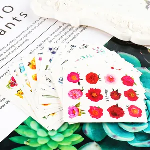 Detailed close-up of floral nail water transfer stickers STZ-981 with red rose patterns
