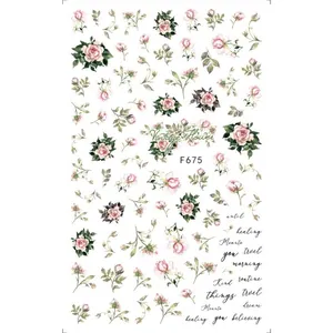 Dettaglio degli adesivi per nail art vintage con rose rosa e motivi floreali chic F675