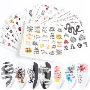 Water transfer nail art stickers featuring snake, letter, and floral patterns with application