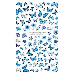 Dettaglio di adesivi per unghie F679 con farfalle blu e motivi floreali assortiti