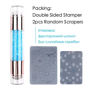 Dual-ended silicone nail stamper with blue rhinestones and floral etching plates