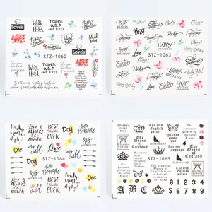 Detail of four nail art sticker sheets featuring letters, hearts, and floral designs
