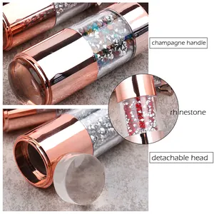 Detail of champagne handle nail stamper with rhinestones and detachable silicone head