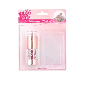 Champagne rose gold nail art stamper with shiny rhinestones in retail packaging