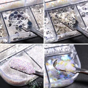 Set of iridescent silver nail glitter flakes and sequins in clear storage box