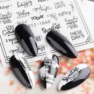 Macro detail of STZ-1060 nail stickers with black and white inspirational quotes