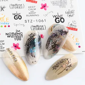 Detail of STZ-1061 nail stickers featuring English text, floral motifs, and smiley faces