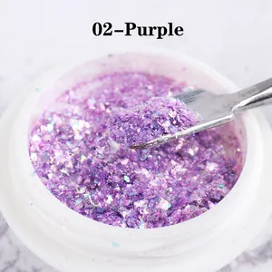 Macro shot of shimmering purple opal nail powder and flakes with a mixing tool