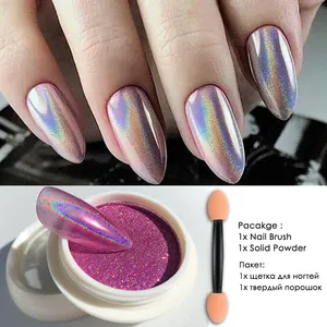 Macro detail of holographic aurora nail powder set with dual-ended sponge brush
