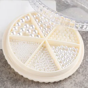 Flatback pearl nail art decorations set in a six-compartment wheel for DIY manicures
