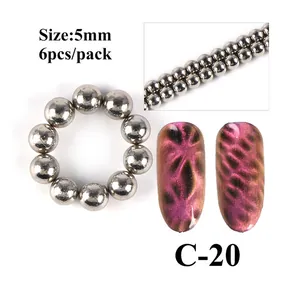 Perlas magnéticas plateadas de 5 mm para nail art con demostración de efecto ojo de gato