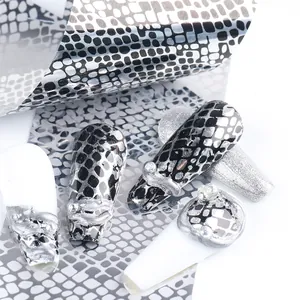 Snake skin pattern nail transfer foils in silver and black with 3D crystal accents