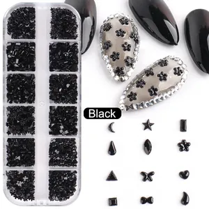Detailed set of black 3D nail art charms in stars and hearts with 12-grid storage box