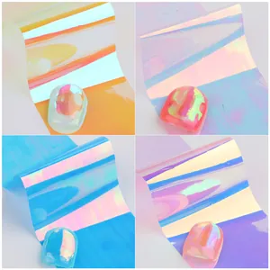 Autocollants d'ongles aurora montrant quatre effets miroir holographiques irisés