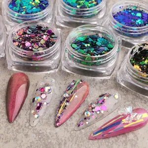 Macro shot of laser holographic hexagonal nail glitter in square jars and art samples