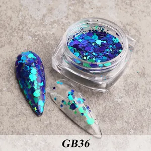 Macro view of blue-green holographic hexagonal nail glitters with polished effects