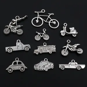Vintage alloy vehicle pendants featuring motorcycle, school bus and truck charms for DIY jewelry