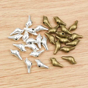 Detailansicht der 3D-Vogel-Legierungsanhänger in Silber und Bronze für DIY-Schmuck