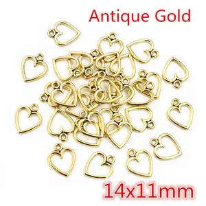 Detailed view of antique gold hollow heart alloy pendants sized 14x11mm for DIY jewelry