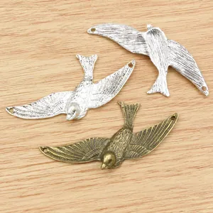 Drei Metalllegierung Adler Anhänger in Bronze und Silber für DIY Schmuckherstellung