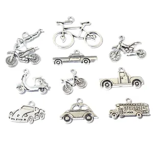 Set of 10 vintage silver alloy pendants featuring various vehicle shapes for DIY jewelry