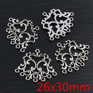 Detail of 4-piece vintage alloy charms with intricate baroque flower patterns, 26x30mm size