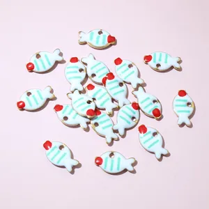 Detailed view of colorful fish-shaped stainless steel charms for DIY jewelry making
