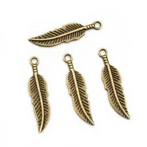 Set of four antique bronze alloy feather pendants for DIY jewelry making accessories