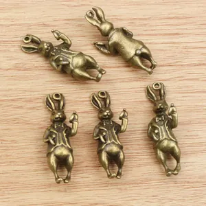 Five vintage 3D rabbit charms in bronze alloy for DIY jewelry and necklaces