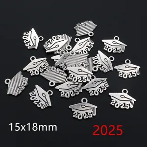 Macro detail of 2025 graduation cap charms in antique silver finish measuring 15x18mm