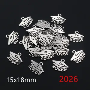 Detailed macro view of 2026 graduation cap pendants in antique silver alloy finish
